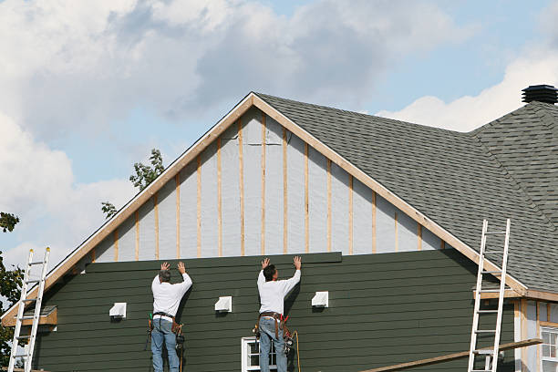 Professional Vinyl Siding technician working in Hamburg, PA